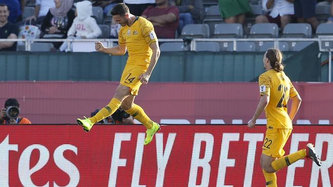 Australia's Apostolos Giannou celebrates after scoring his side's third goal.