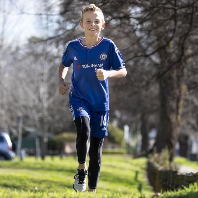 The 11-year-old had to relearn how to walk using a walking frame up and down the hospital corridors. Picture: Matthew Vasilescu