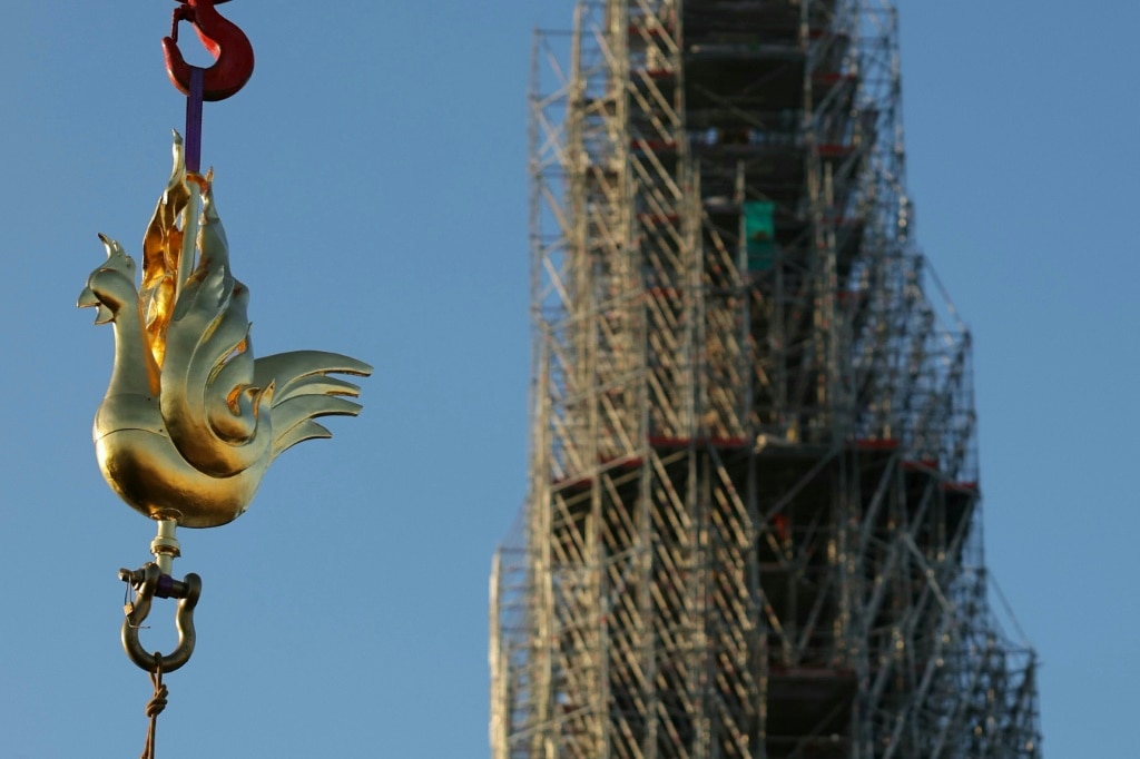 golden-rooster-fitted-to-spire-of-paris-s-notre-dame-cathedral-the
