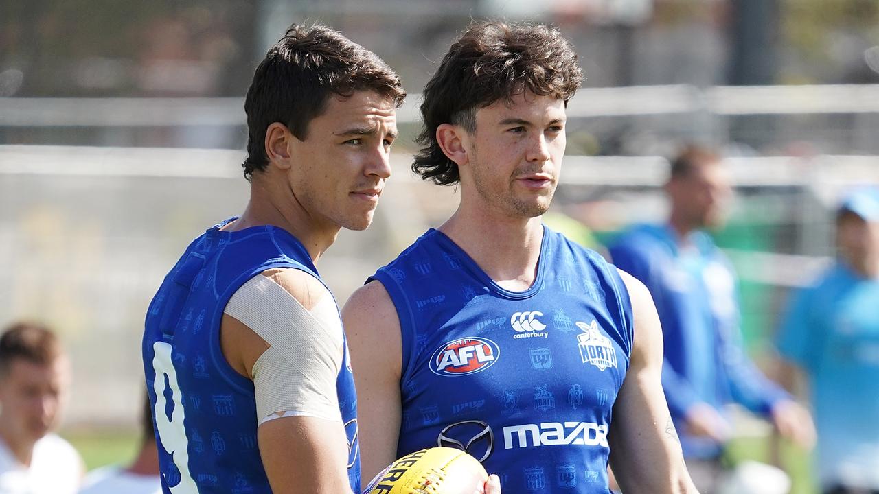 Jasper Pittard, right, with team-mate Luke Davies-Uniacke at North Melbourne training.