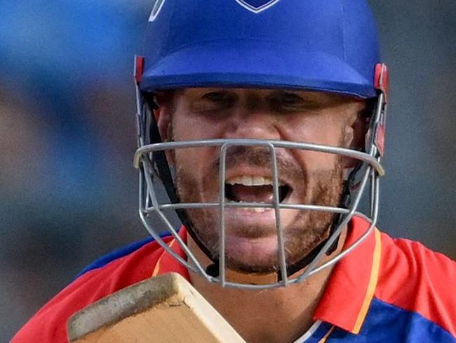 Delhi Capitals' David Warner reacts after playing a shot during the Indian Premier League (IPL) Twenty20 cricket match between Mumbai Indians and Delhi Capitals at the Wankhede Stadium in Mumbai on April 7, 2024. (Photo by INDRANIL MUKHERJEE / AFP) / -- IMAGE RESTRICTED TO EDITORIAL USE - STRICTLY NO COMMERCIAL USE --