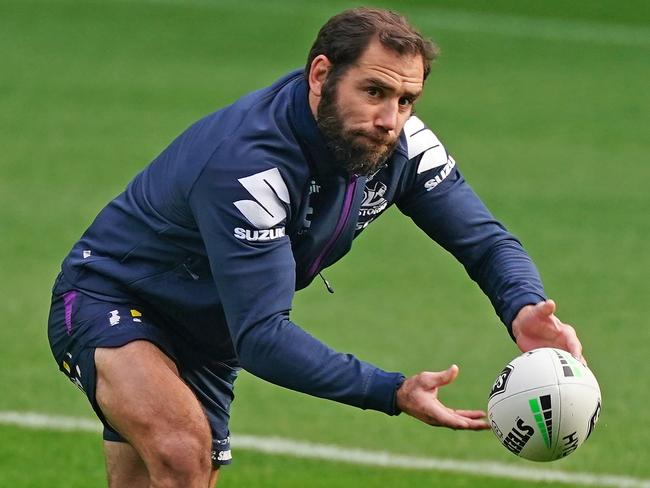 Cameron Smith passes the ball during a Melbourne Storm NRL training session at AAMI Park in Melbourne, Thursday, May 14, 2020. (AAP Image/Scott Barbour) NO ARCHIVING