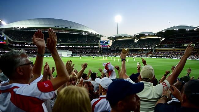 Spectators in the crowd enjoy the atmosphere during day three of the Second Test match in the Ashes series between Australia and England at the Adelaide Oval on December. Picture: Quinn Rooney