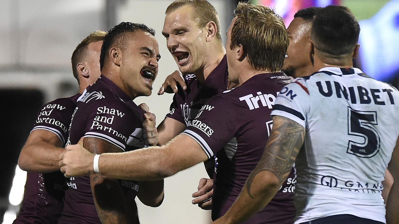 MACKAY, AUSTRALIA - SEPTEMBER 17: Dylan Walker of the Sea Eagles celebrates with teammates after scoring a try during the NRL Semi-Final match between the Manly Sea Eagles and the Sydney Roosters at BB Print Stadium on September 17, 2021 in Mackay, Australia. (Photo by Matt Roberts/Getty Images)