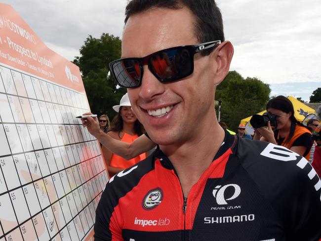 Australian rider Richie Porte of team BMC Racing signs on before the start of stage 1 of the Tour Down Under in Adelaide, Tuesday, Jan. 19, 2016. (AAP Image/Dan Peled) NO ARCHIVING, EDITORIAL USE ONLY