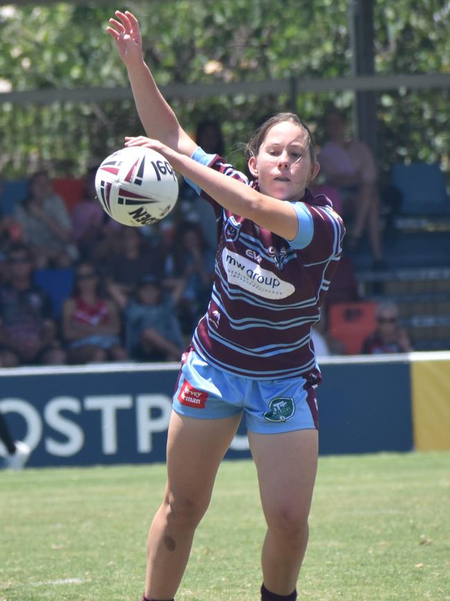 Josie Wogand gets a pass away during the pre-season trial against the Mackay Cutters.