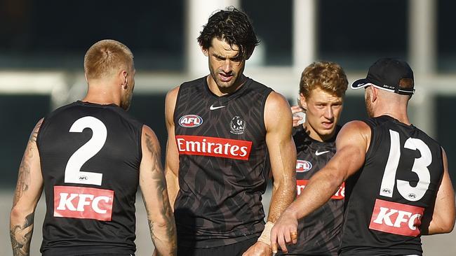 Grundy with Taylor Adams, Jordan De Goey and Fin Macrae during his time at Collingwood. Picture: Mike Owen/Getty Images