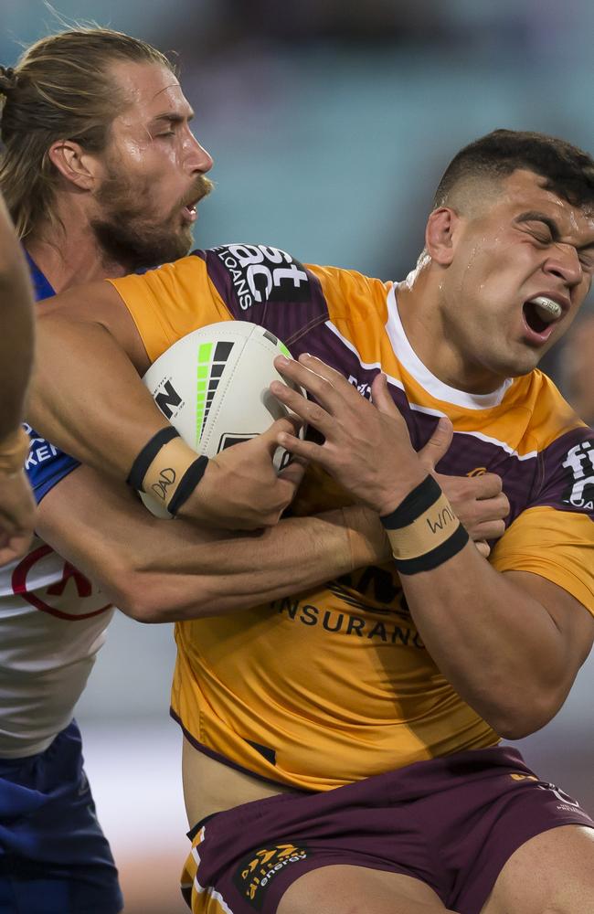 Kieran Foran of the Bulldogs tackles David Fifita of the Broncos during the Round 25 NRL match between the Canterbury Bulldogs and the Brisbane Broncos. Picture: AAP