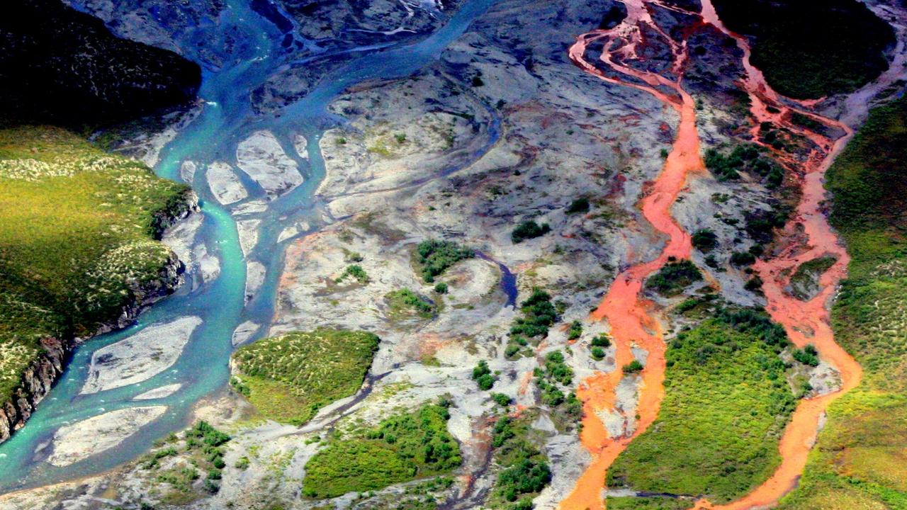 Remote rivers and streams in northern Alaska's Brooks Range are turning orange due to minerals exposed by thawing permafrost. Picture: Ken Hill/National Park Service