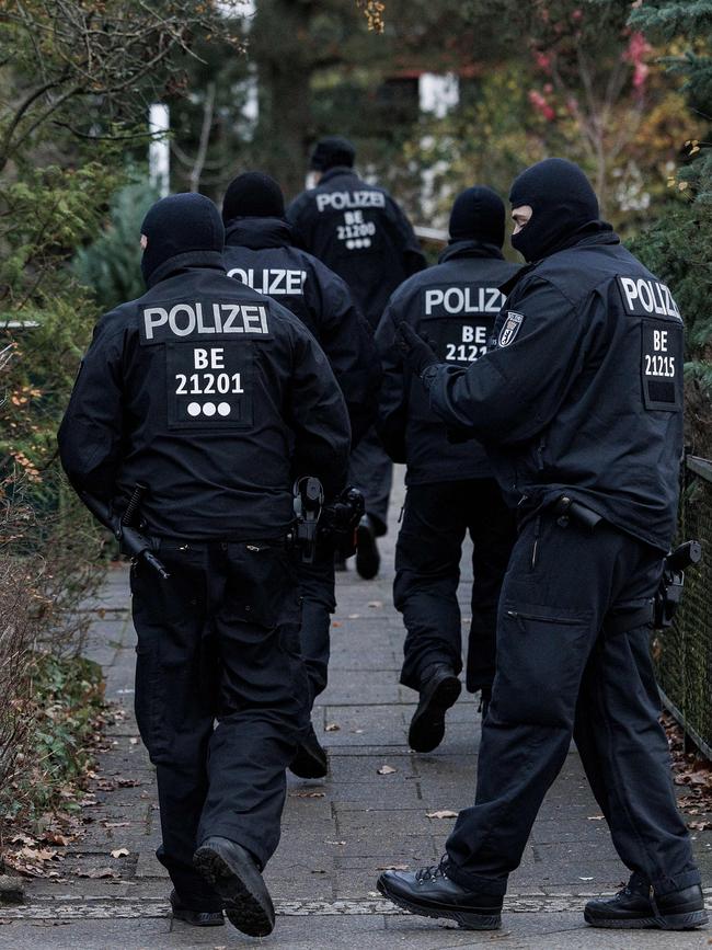 Police at a Berlin home they raided as part of anti terror probe.