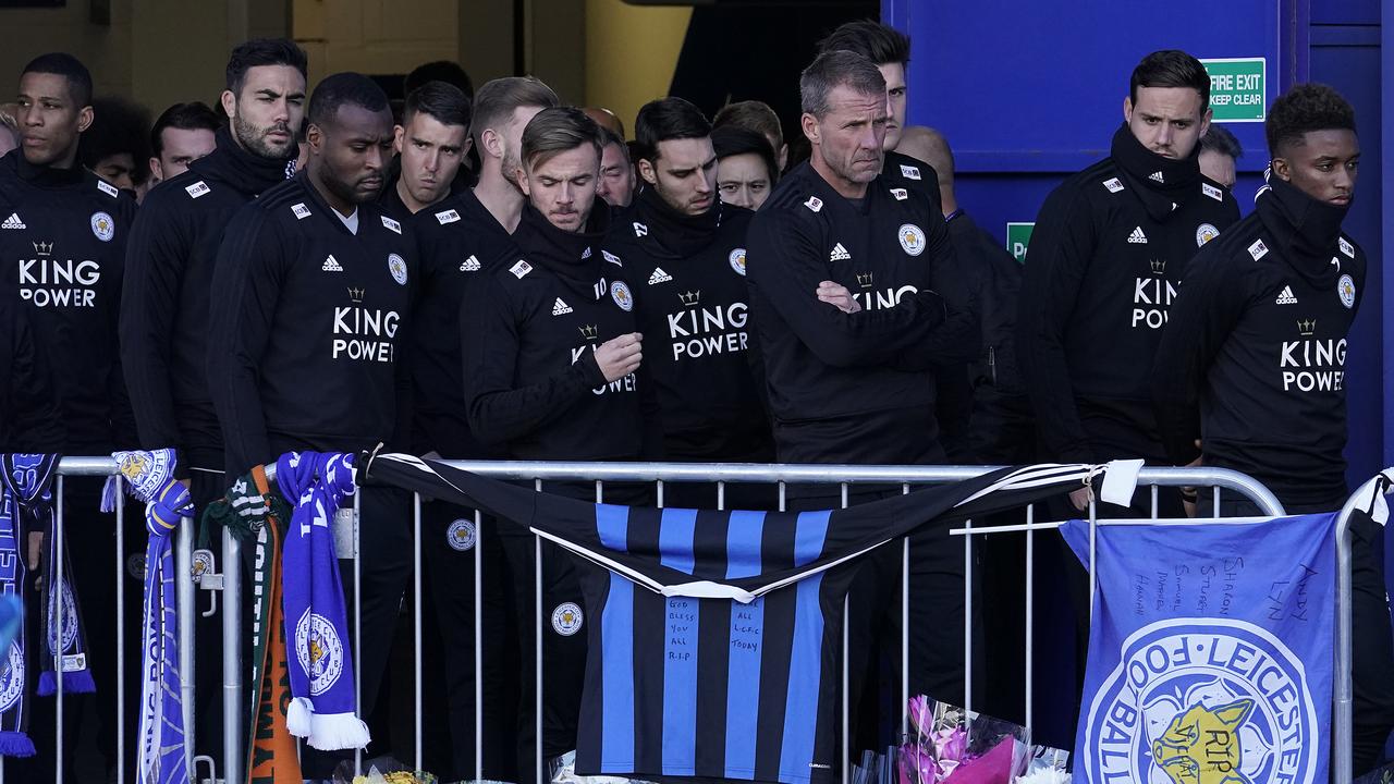 Leicester City Football Club players pay their respects. (Photo by Christopher Furlong/Getty Images)