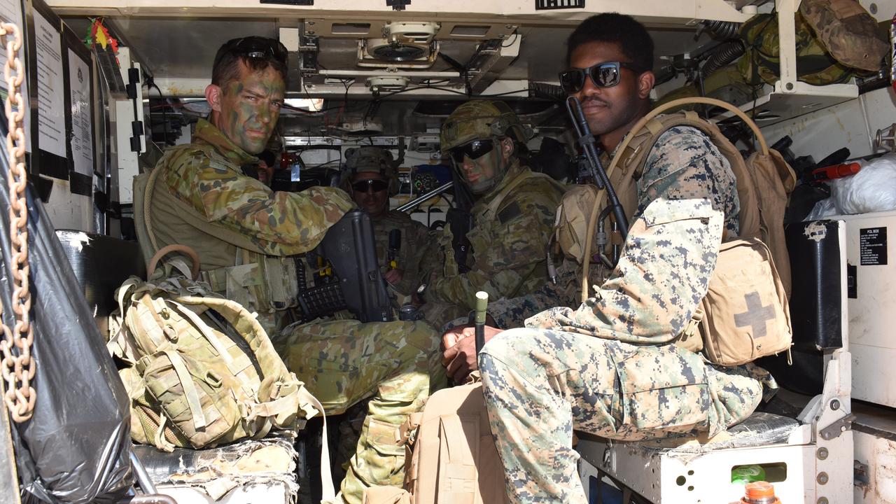 Exercise Talisman Sabre participants load into an armed personnel carrier after the open day at Port Denison Sailing Club, Bowen on Sunday. Picture: Kirra Grimes