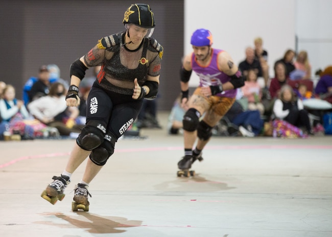 Roller Derby Star Eze-Kill rolling through a match. Picture: Supplied