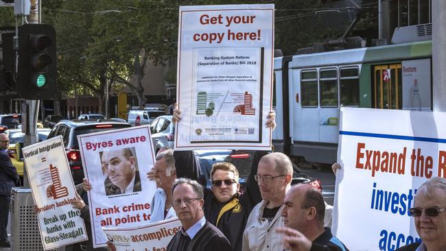 Protesters rallied outside the Commonwealth Law Courts Building in Melbourne as the royal commission's hearings on the financial advice industry started. (Pic: Luis Ascui)