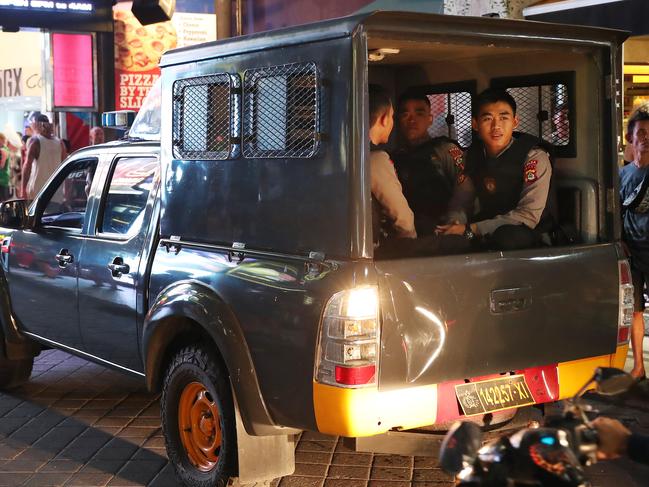 A truck load of local police arrive after the fight among the schoolies. Picture: Liam Kidston
