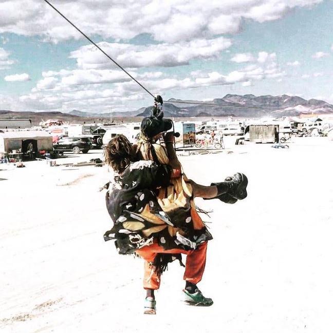 Australian model Jordan Barrett and American socialite Paris Hilton at the 2016 Burning Man Festival in the Black Rock Desert, Nevada ... 