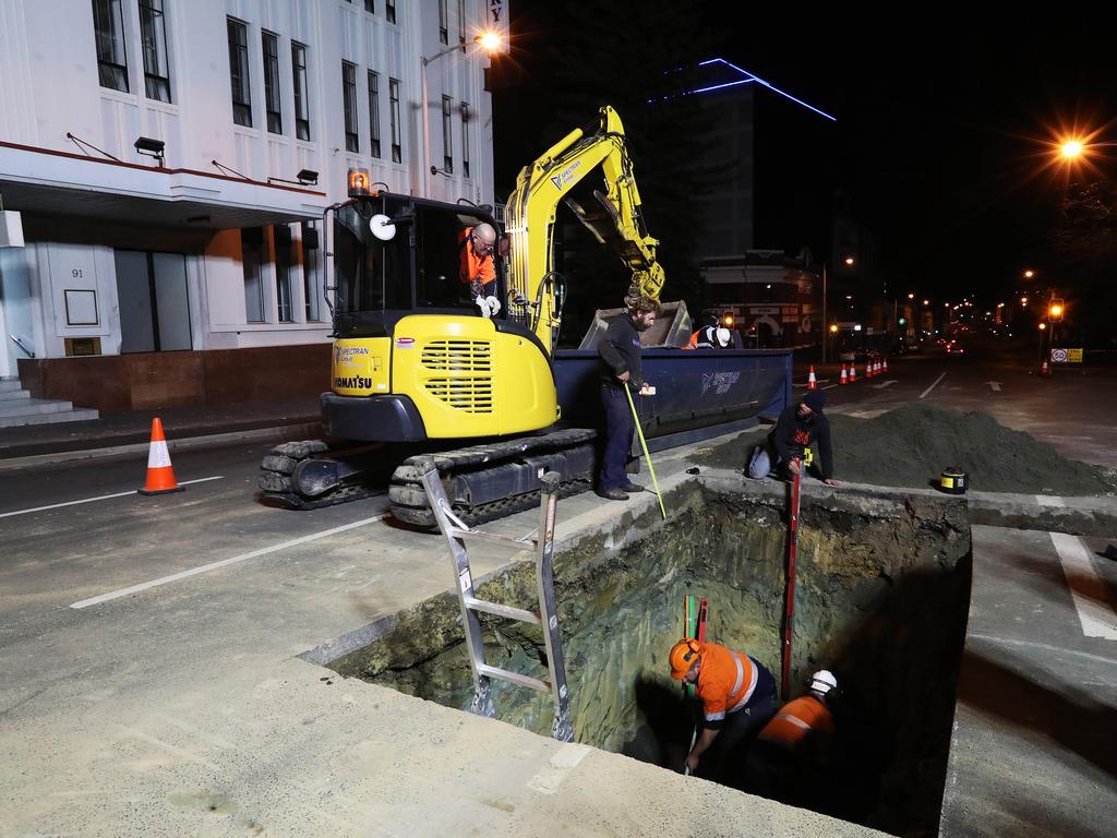 Work in Macquarie Street Hobart on the hole that will house the chamber performance artist Mike Parr will live in for 72 hours during Dark Mofo. Picture: NIKKI DAVIS-JONES