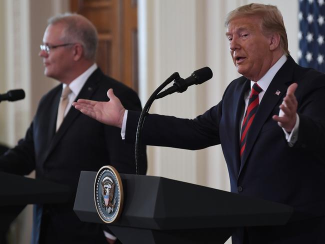 Morrison and Trump takes questions from the media pack. Picture: Susan Walsh