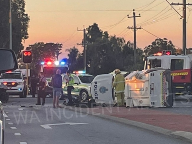 Police car flips onto side after crash