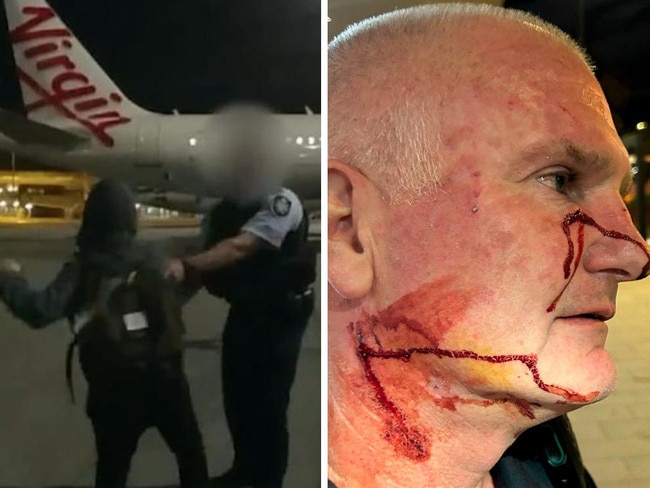 Horror alleged attack on cop at busy airport