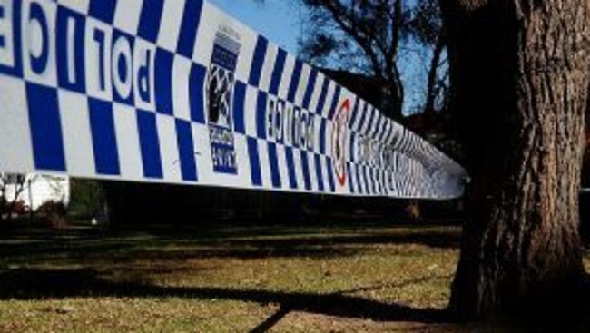 21/6/03 Police tape at ELS Hall Park, Marsfield. Picture: Mat Sullivan Pic. Unknown crime scene logox