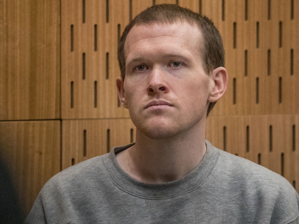 Christchurch mosque gunman Brenton Tarrant listens as Crown prosecutor Mark Zarifeh delivers his submission during his sentencing hearing at Christchurch High Court.