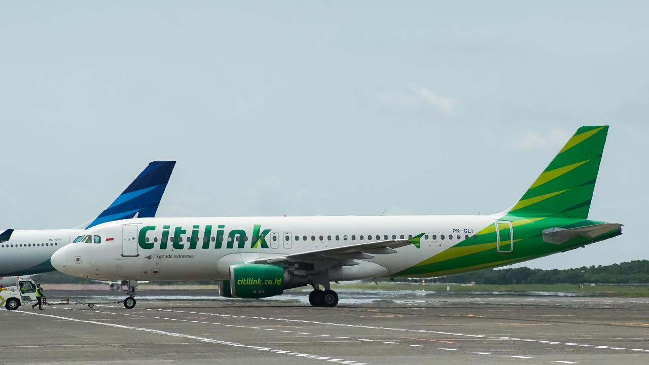 An Indonesian man with Covid-19 disguised himself as his virus-free wife to board a commercial flight in the country.