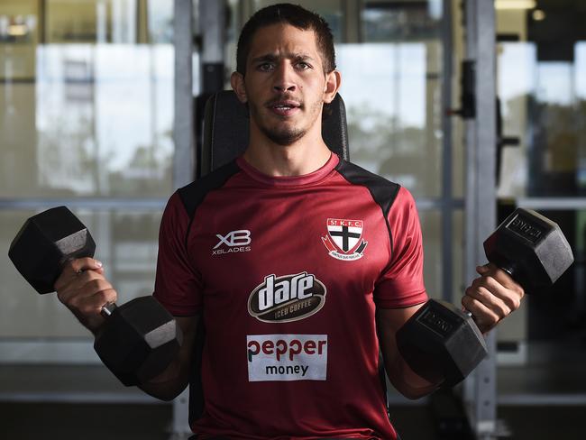 Young Saint Ben Long tries to add some muscle in the gym in Darwin. Picture: Keri Megelus