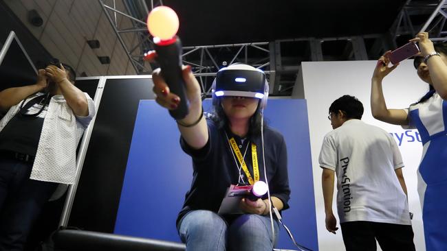 PlayStation VR players are well advised to invest in wireless controllers. Picture: Tomohiro Ohsumi/Getty Images