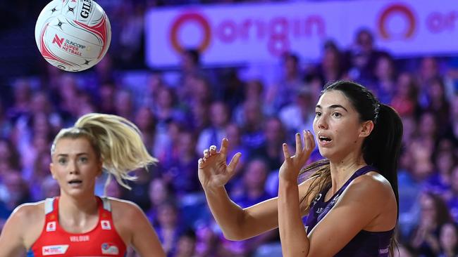 BRISBANE, AUSTRALIA - APRIL 28: Remi Kamo of the Firebirds passes the ball during the round three Super Netball match between Queensland Firebirds and NSW Swifts at Nissan Arena, on April 28, 2024, in Brisbane, Australia. (Photo by Albert Perez/Getty Images)