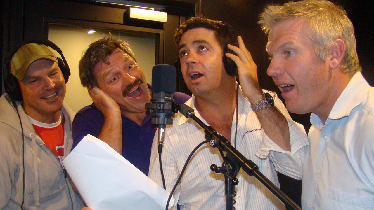 Danny Frawley (right) hams it up with Triple M’s commentary team Jason Dunstall (left), Brian Taylor and Garry Lyon.