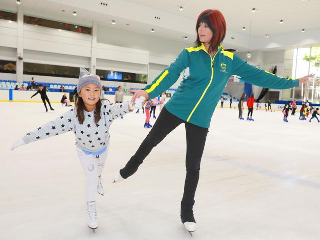 Hhuyao Zhang, 6, has a skating lesson with Winter Olympian skating director Monica MacDonold at Macquarie Ice Rink this week. Picture: Angelo Velardo