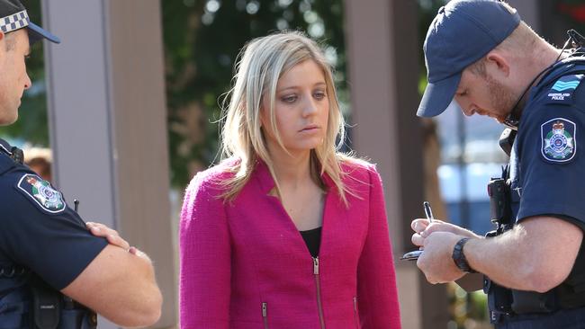 Journo from Chan 9 Alex Bernhardt after cigarette brushed her face ,Associates abusing media after sentenceing at Court appearance for Stevee Kennedy who allegedly stabbed her former partner Freeman Brookes in Caboolture on Saturday night..Pic Annette Dew
