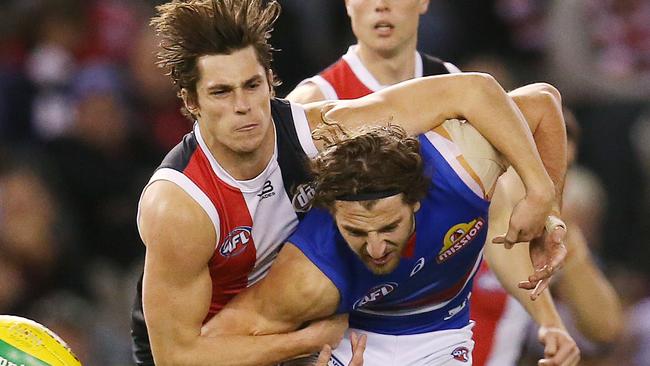 AFL Round 18. 21/07/2019.  St Kilda v Western Bulldogs at Marvel Stadium.  Bulldog Marcus Bontempelli  tackled by Jack Steele of the Saints 3rd quarter    .  Pic: Michael Klein