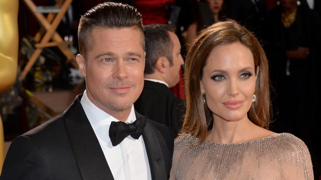 Loved up ... Hollywood stars Brad Pitt and Angelina Jolie have wed in a private ceremony in France. Picture: Getty Images