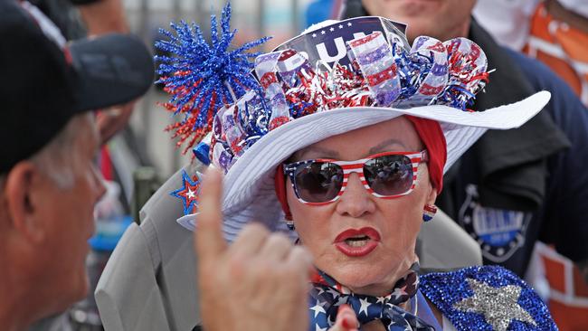 Supporters of US President Donald Trump que outside the Amway Center on June 18, 2019 before a campaign event in Orlando, Florida. - President Trump is expected to launch his 2020 re-election campaign in Orlando, June 18. (Photo by Gregg Newton / AFP)