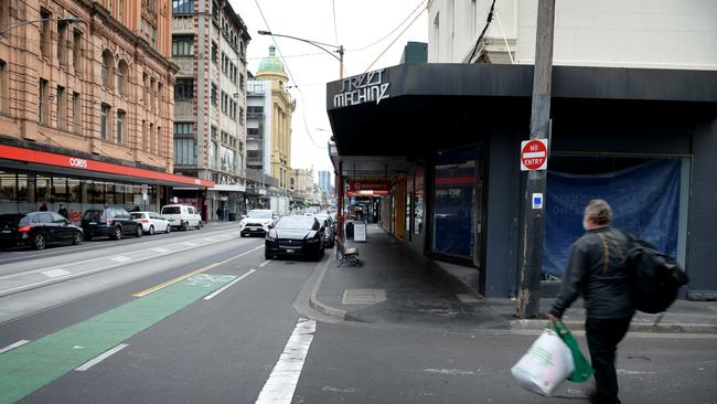 People walk past empty shops on Chapel Street, Prahran, Melbourne. Picture: Andrew Henshaw/NCA NewsWire