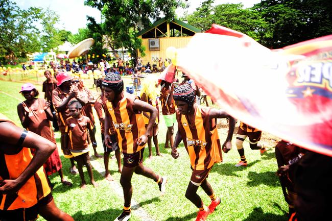 Tapalinga Superstars take to the field ahead of the grand final match against the Ranku Eagles on Sunday during this year's 49th Annual Tiwi Grand Final on Bathurst Island which is part of the Tiwi Islands chain, north of Darwin, NT. Picture: Justin Kennedy