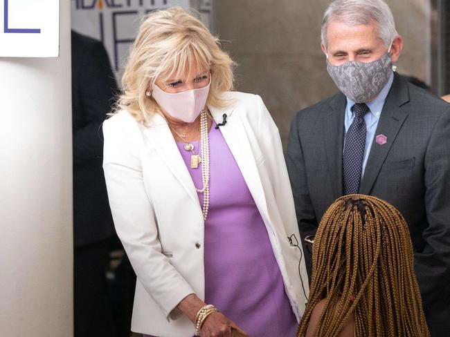 NEW YORK, NY - JUNE 06: U.S. First Lady Dr. Jill Biden and Dr. Anthony Fauci, Director of the National Institute of Allergy and Infectious Diseases, speaks with a person getting vaccinated at Abyssinian Baptist Church on June 6, 2021 in New York City. Abyssinian Baptist Church has been offering COVID-19 vaccines in Harlem, where the infection rate has been higher than the rest of the city but the vaccine rate is roughly only seven percent.   Jeenah Moon/Getty Images/AFP == FOR NEWSPAPERS, INTERNET, TELCOS & TELEVISION USE ONLY ==