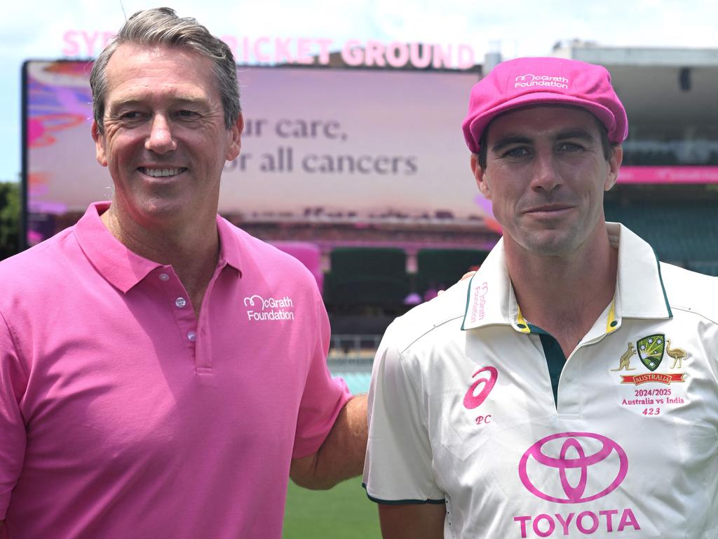 Former Australian cricketer Glenn McGrath (L) poses with Australian captain Pat Cummins. Picture: AFP