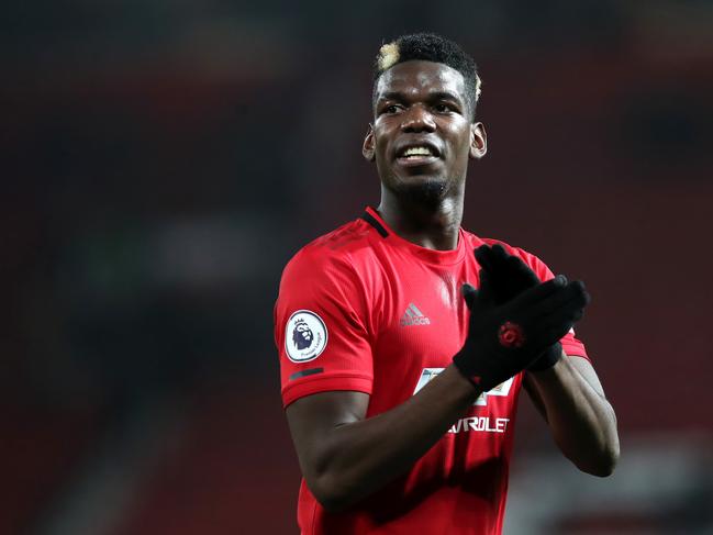 MANCHESTER, ENGLAND - DECEMBER 26: Paul Pogba of Manchester United applauds fans after the Premier League match between Manchester United and Newcastle United at Old Trafford on December 26, 2019 in Manchester, United Kingdom. (Photo by Ian MacNicol/Getty Images)