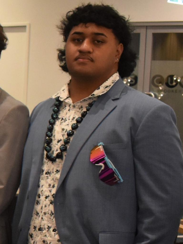 A strong combination of ski glasses, Converses and a mullet worked to perfection at the Nambour State College formal this year. Picture: Eddie Franklin