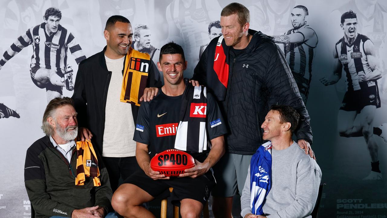 From left to right: Michael Tuck, Shaun Burgoyne, Scott Pendlebury, Dustin Fletcher and Brent Harvey gathered to mark Pendlebury’s 400th game this Saturday against Collingwood (with Kevin Bartlett absent). Picture: Michael Willson / Getty Images