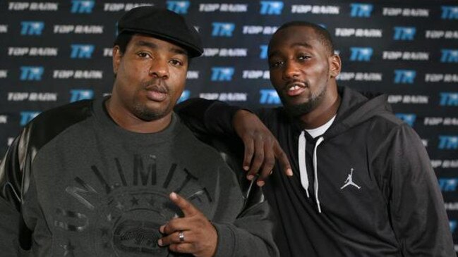 Terence Crawford and his potty-mouthed trainer Brian McIntyre (left).
