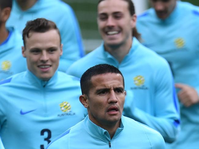 Tim Cahill (Centre) leads the Socceroos as they jog laps during training at AAMI Park in Melbourne, Sunday, September 3, 2017. Australia plays Thailand in their final group qualifier on Tuesday. AAP Image/Julian Smith) NO ARCHIVING