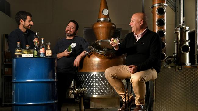 George Georgiadis, President of South Australian Spirit Producers Association (SASPA) with Sean Baxter, co-founder and brand director of Never Never Distilling co, and Minister David Basham at Chalk Hill, McLaren Vale. Picture: Tricia Watkinson
