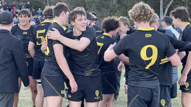 St Laurence's celebrate the premiership.