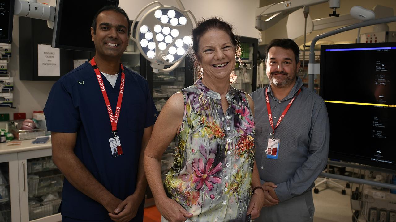 Rose Kruze recently reunited with the Townsville doctors who helped her reclaim her life after discovering her debilitating headaches were actually caused by a cerebrospinal fluid leak. She's picture with Dr Usman Manzoor (left) and Dr Ramon Navarro.