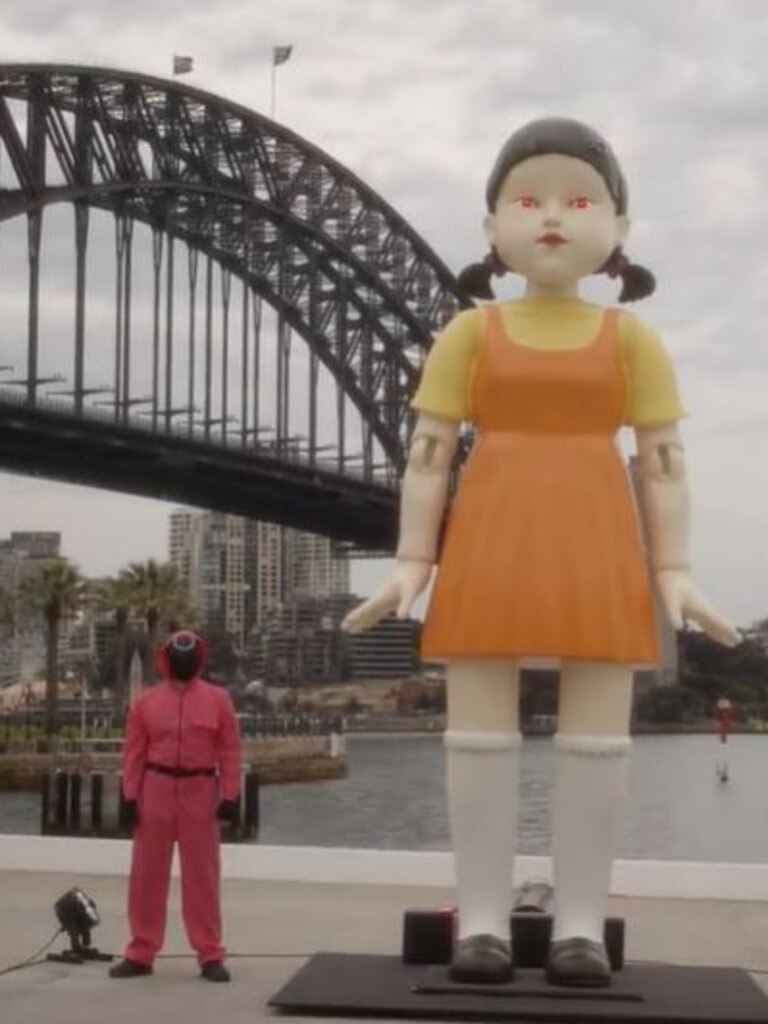 A giant Squid Games doll was placed at Circular Quay as part of a marketing campaign for the series. Picture: Netflix