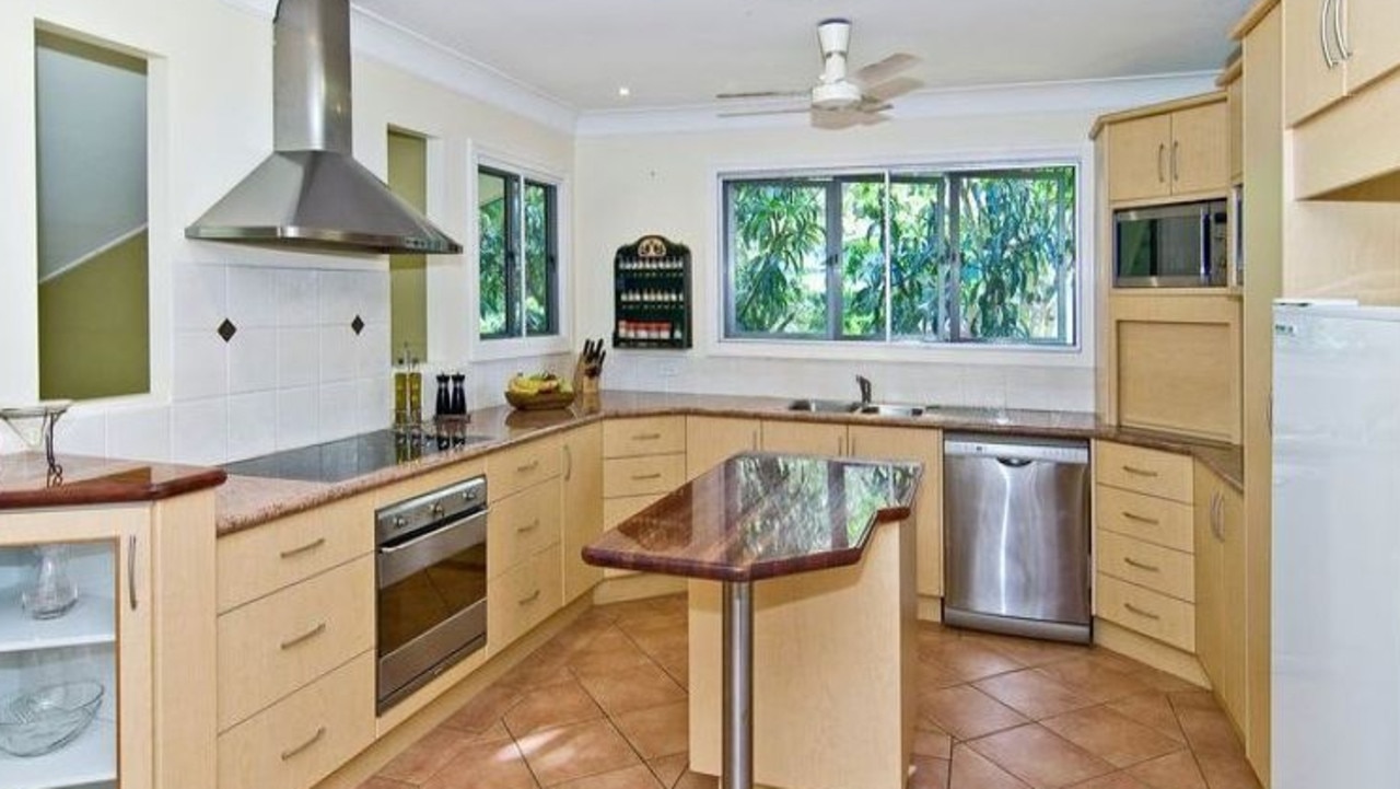 BEFORE: The kitchen in the house at 26 Gracemere St, Newmarket, before it was renovated.